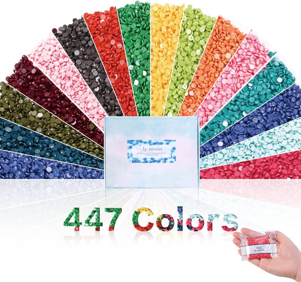 Lot de 447 perles rondes DMC de toutes les couleurs. 